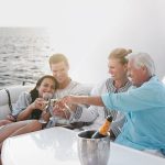 A Family drinking Champagne on a yacht
